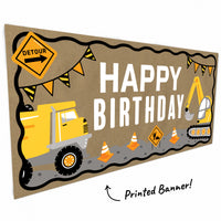 Close-up of yellow trucks and caution cone artwork
