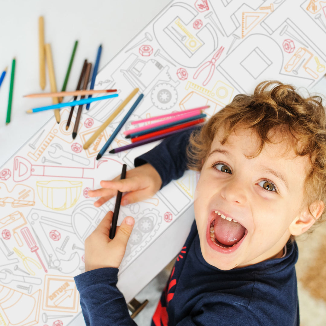 Kids coloring construction table runner at birthday party