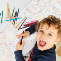 Kids coloring construction table runner at birthday party