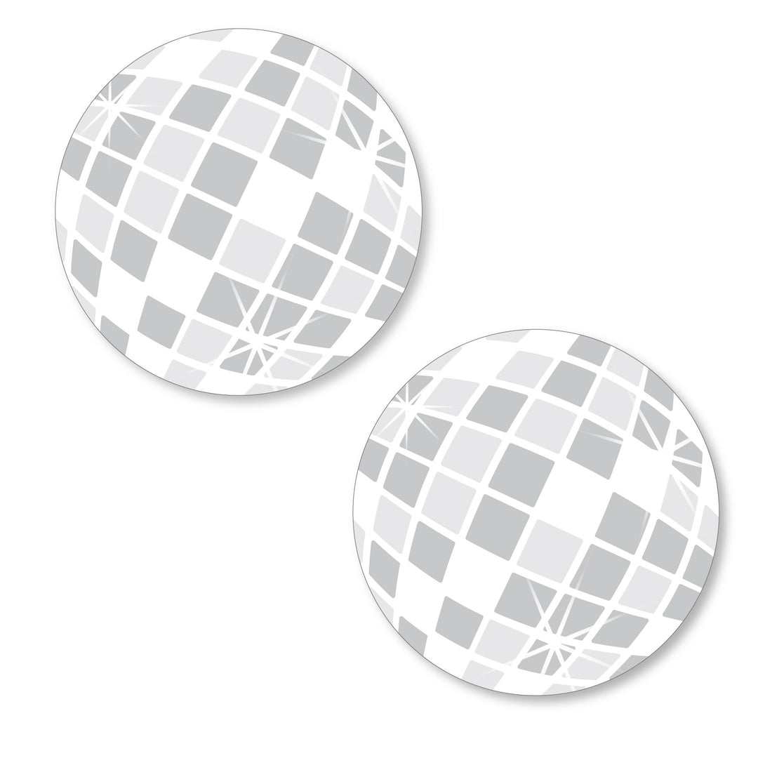 A set of two disco ball shaped paper cut-outs with a geometric pattern.