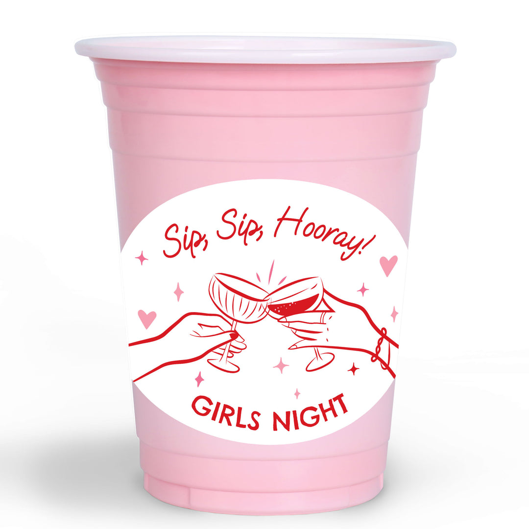 pink plastic party cups with cocktail sticker design close up