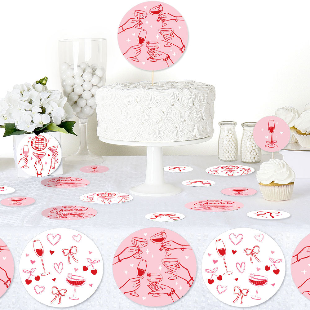girls night party table styled with cocktail confetti decor