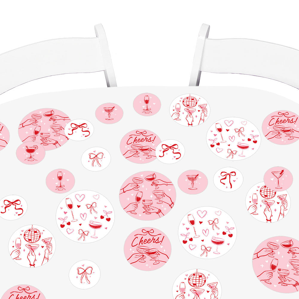 girls night party table styled with cocktail confetti decor