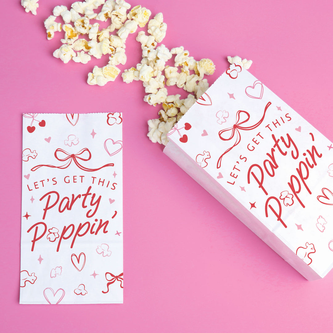 snack table with popcorn bags at girls night