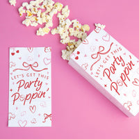 snack table with popcorn bags at girls night