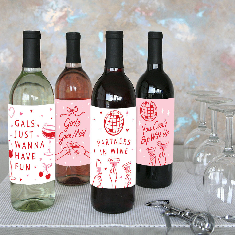 drink station with decorated wine bottles