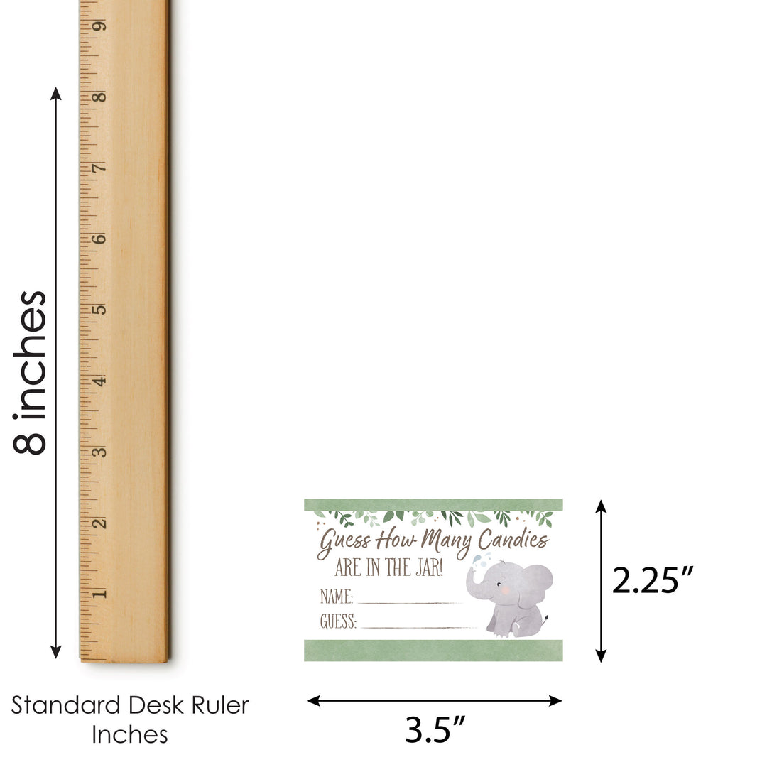 Measurement chart showing an elephant game card next to a ruler for scale.