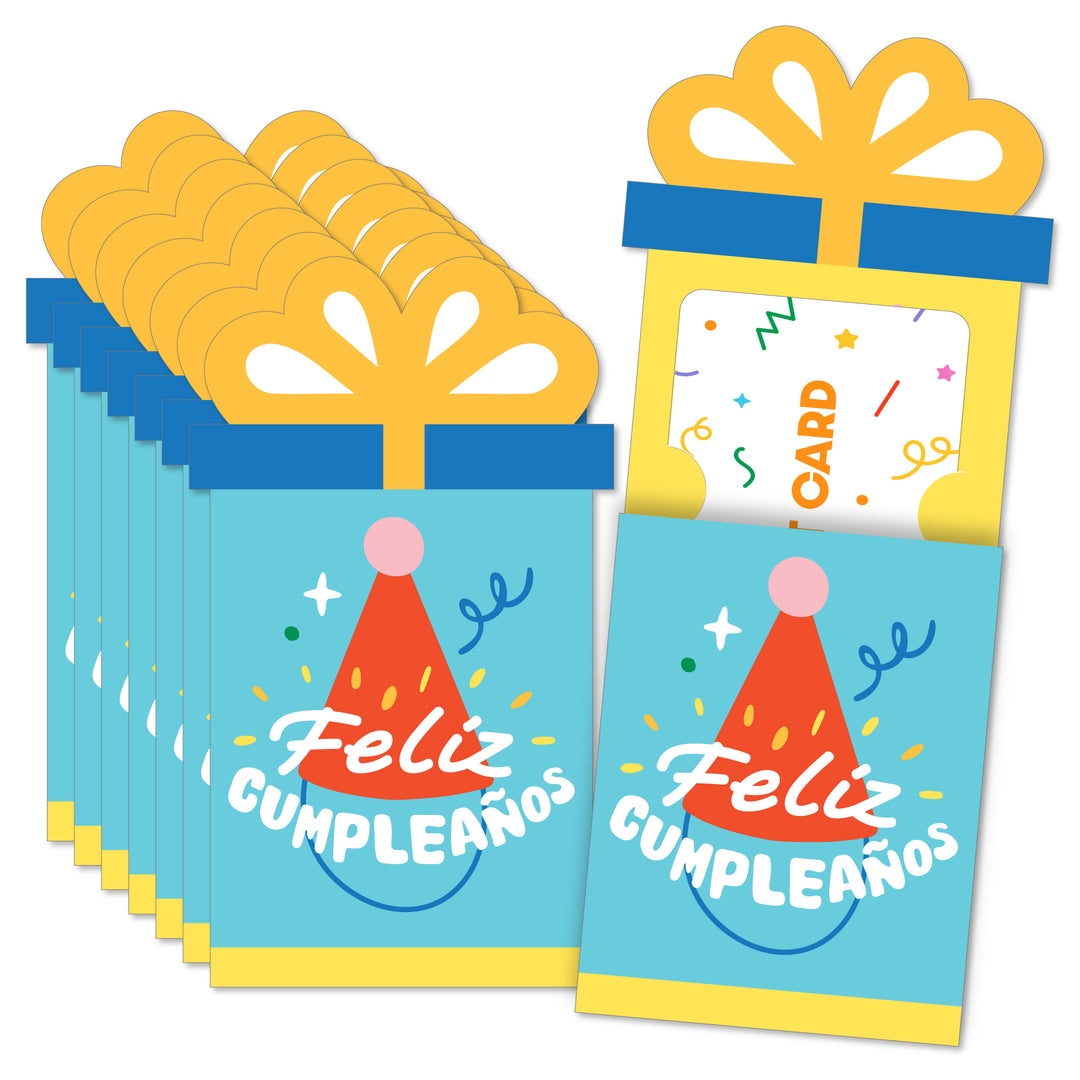 A collection of Feliz Cumpleaños-themed gift card holders with blue and yellow colors and party hat graphics, accompanied by white envelopes.