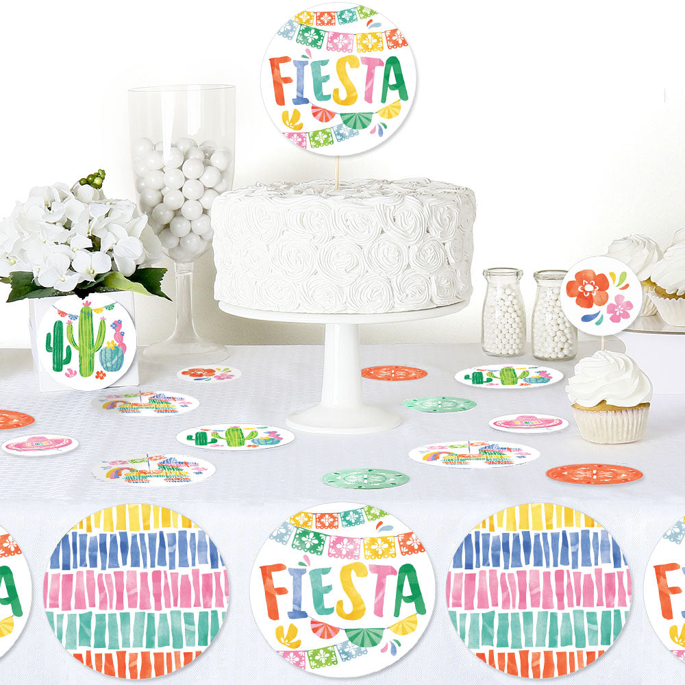 Fiesta party table styled with circle confetti