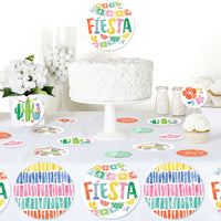 Fiesta party table styled with circle confetti