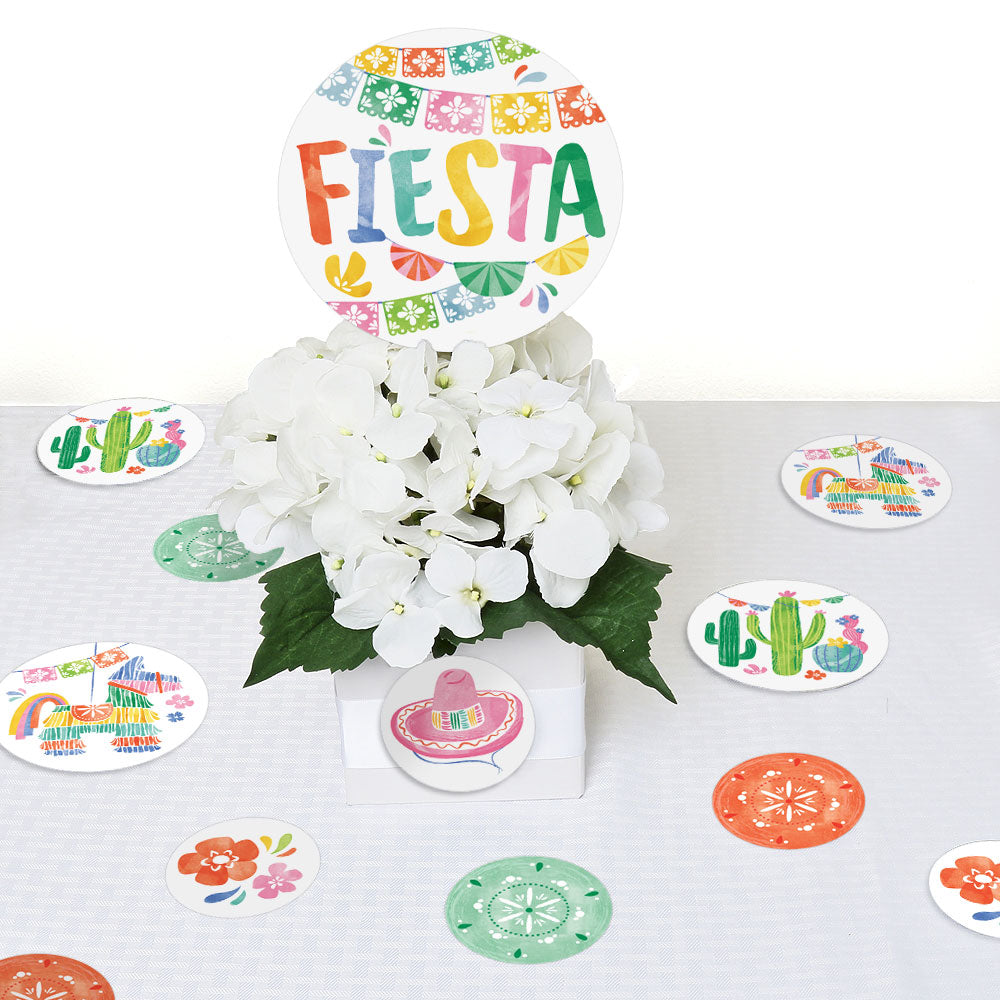 Fiesta party table styled with circle confetti
