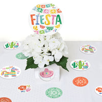 Fiesta party table styled with circle confetti