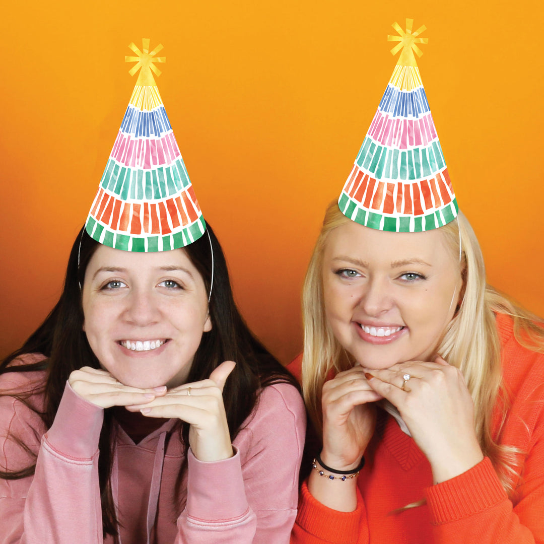Fiesta birthday party guests wearing hats