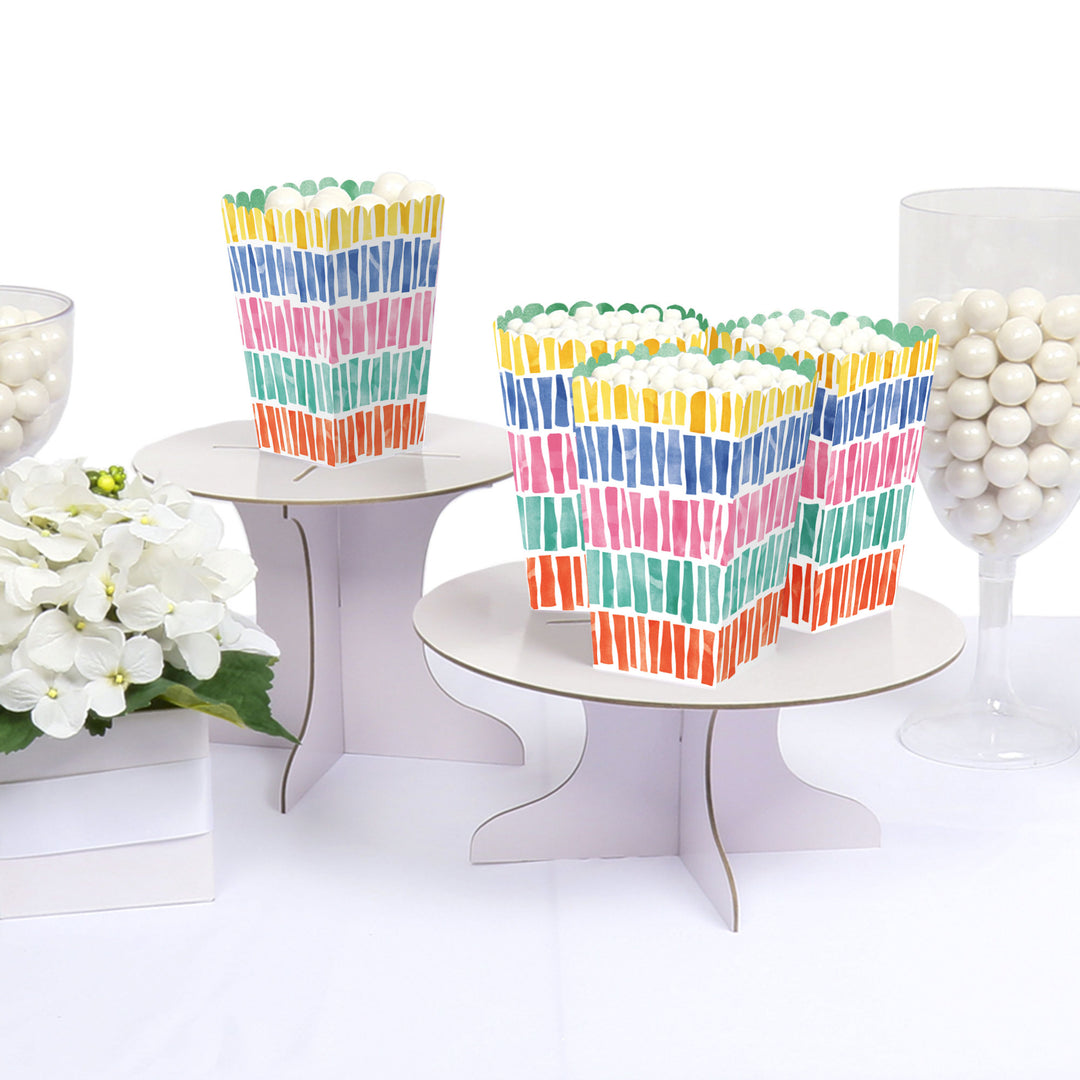 Fiesta snack table with popcorn boxes