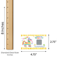 Desk ruler with dimensions and a scratch-off card on a white background