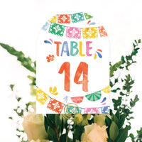 Colorful table number 14 with decorative elements on a white background