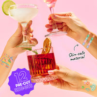 Three hands holding cocktails with tattoos on a pink background, featuring 'Skin-safe material' text.