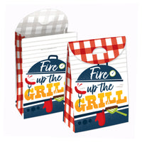 Two goodie bags with 'Fire Up the Grill' theme, featuring red and white checkered patterns and grill imagery.