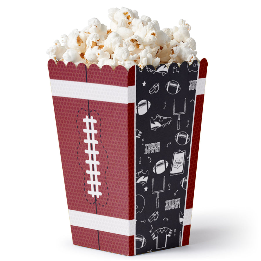 A set of popcorn treat boxes with a football theme, featuring red and white stripes and black accents with football graphics.
