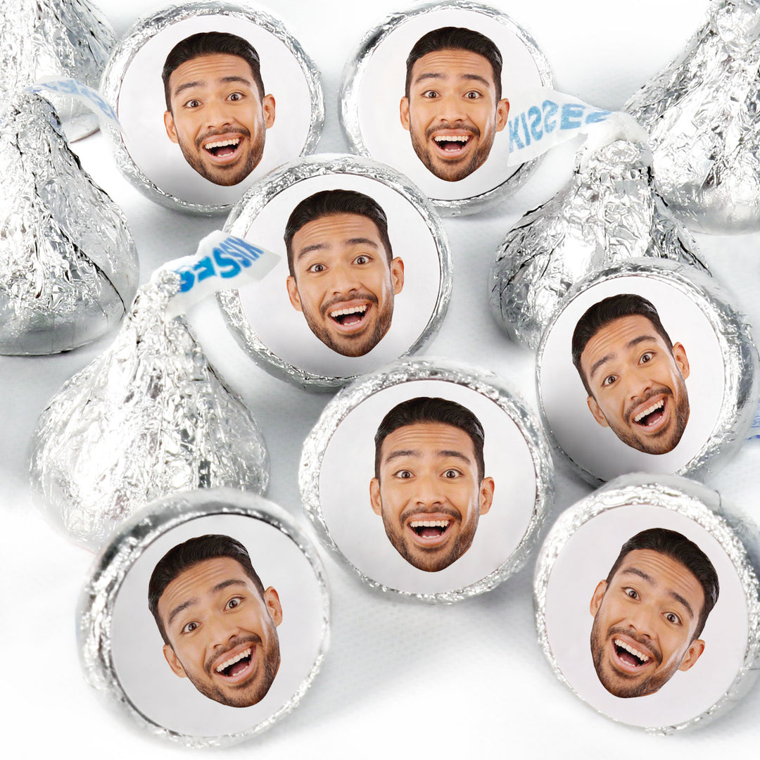 A collection of round candy stickers with a custom photo of a smiling person printed on them, displayed on a white background.