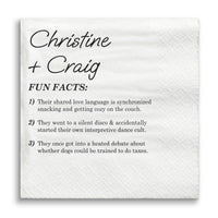 White wedding napkin with custom black text featuring a humorous 'Fun Facts' about the couple