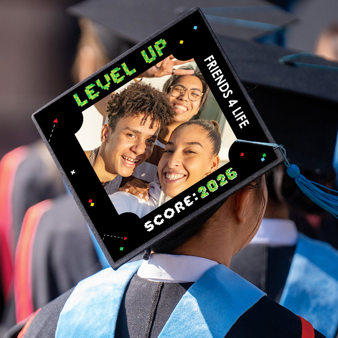 Graduation cap styled with video game photo topper