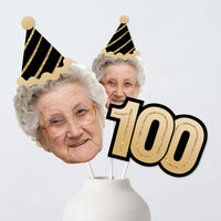 Custom 100th birthday fun face table toppers with black and gold hat