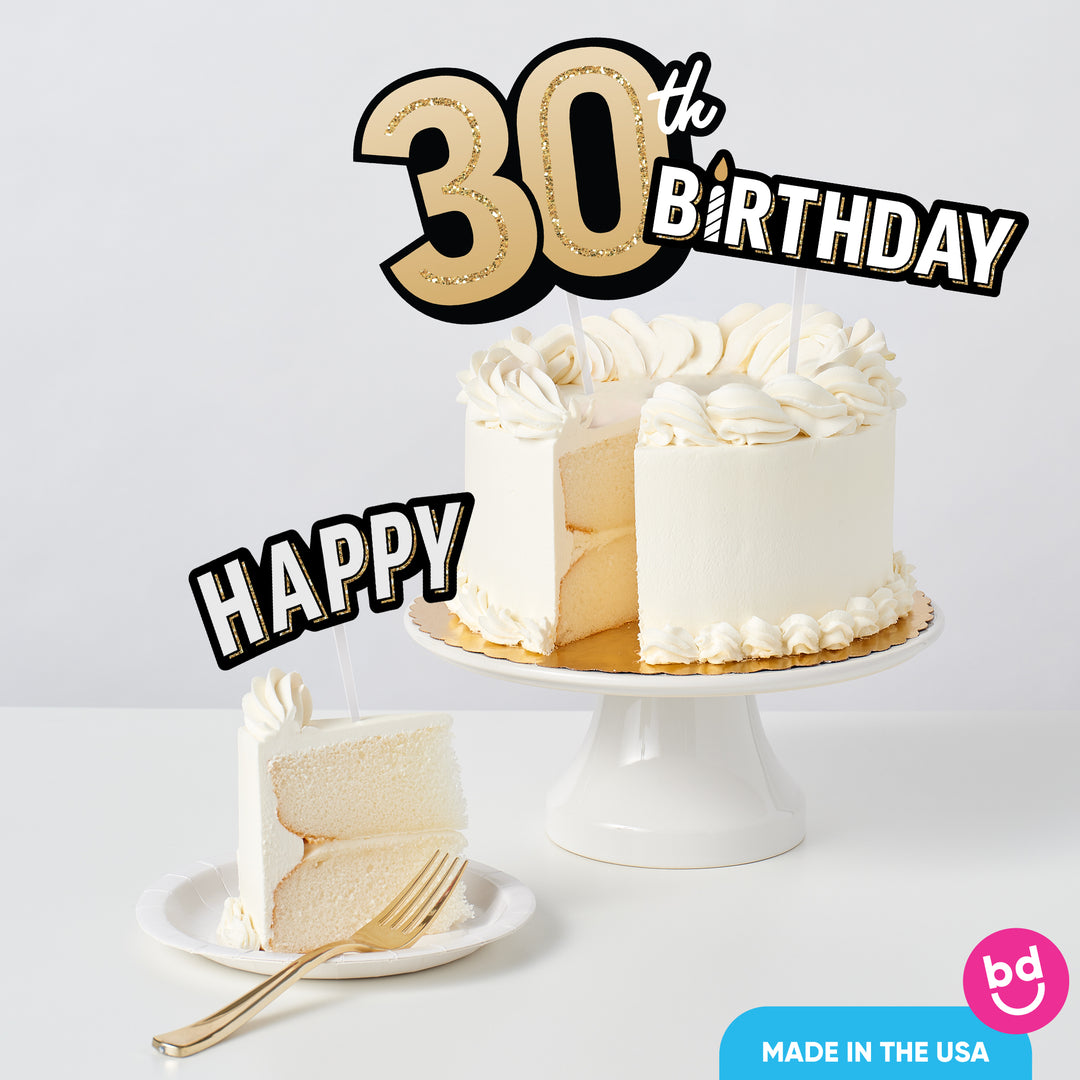 Adult 30th birthday cake with black and gold toppers styled