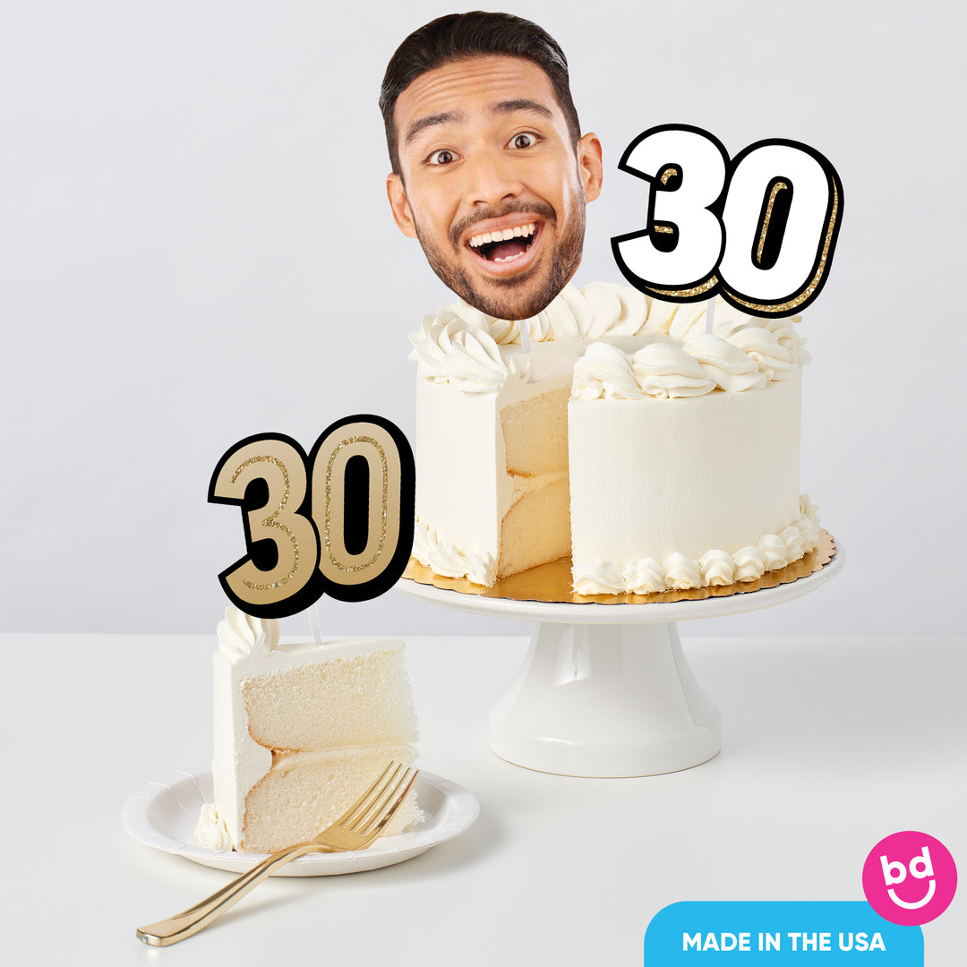 Adult 30th birthday cake with black and gold toppers styled