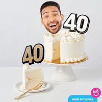 Over-the-hill 40th birthday cake styled with gold toppers