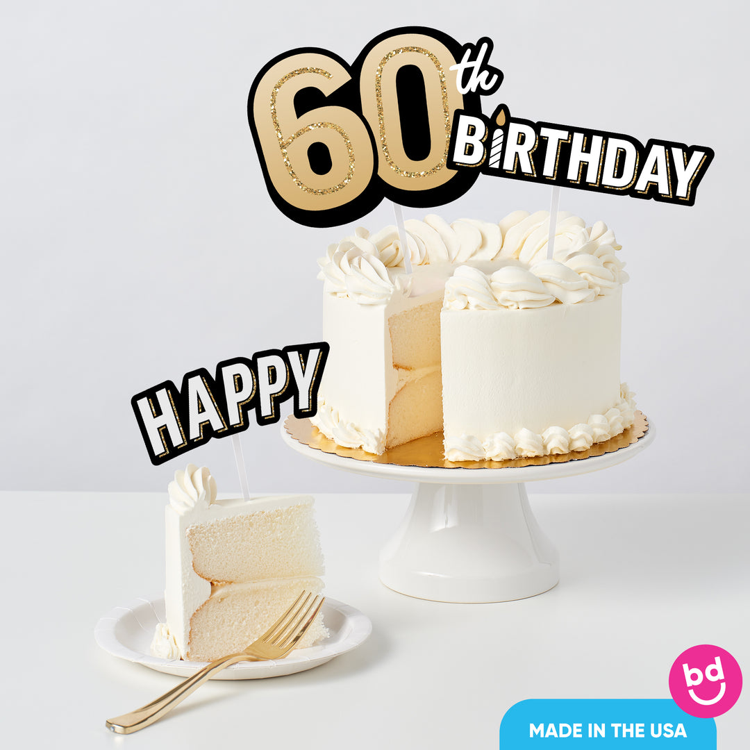 Adult 60th birthday cake styled with black and gold toppers