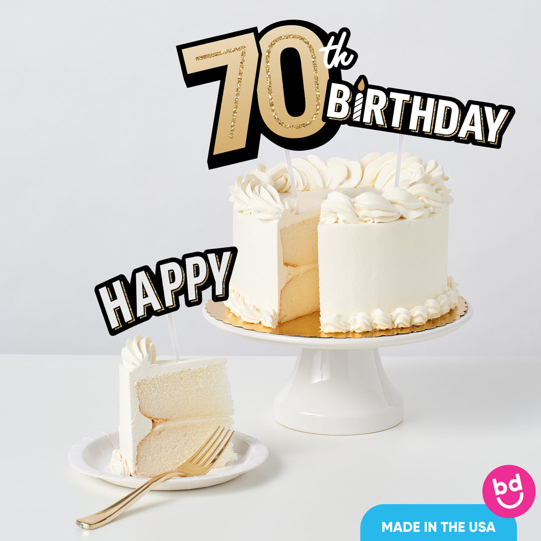 Adult 70th birthday cake decorated with gold toppers