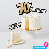 Adult 70th birthday cake decorated with gold toppers