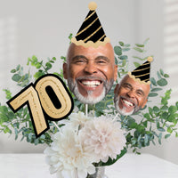 70th birthday centerpiece display with personalized face decorations