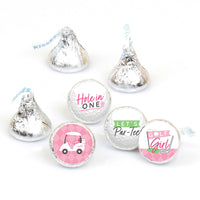 Round candy stickers with various pink designs including a golf ball, text reading 'hole in one', and 'let's par-tee'. Stickers are intended for use on round bite-sized candies like chocolate kisses.