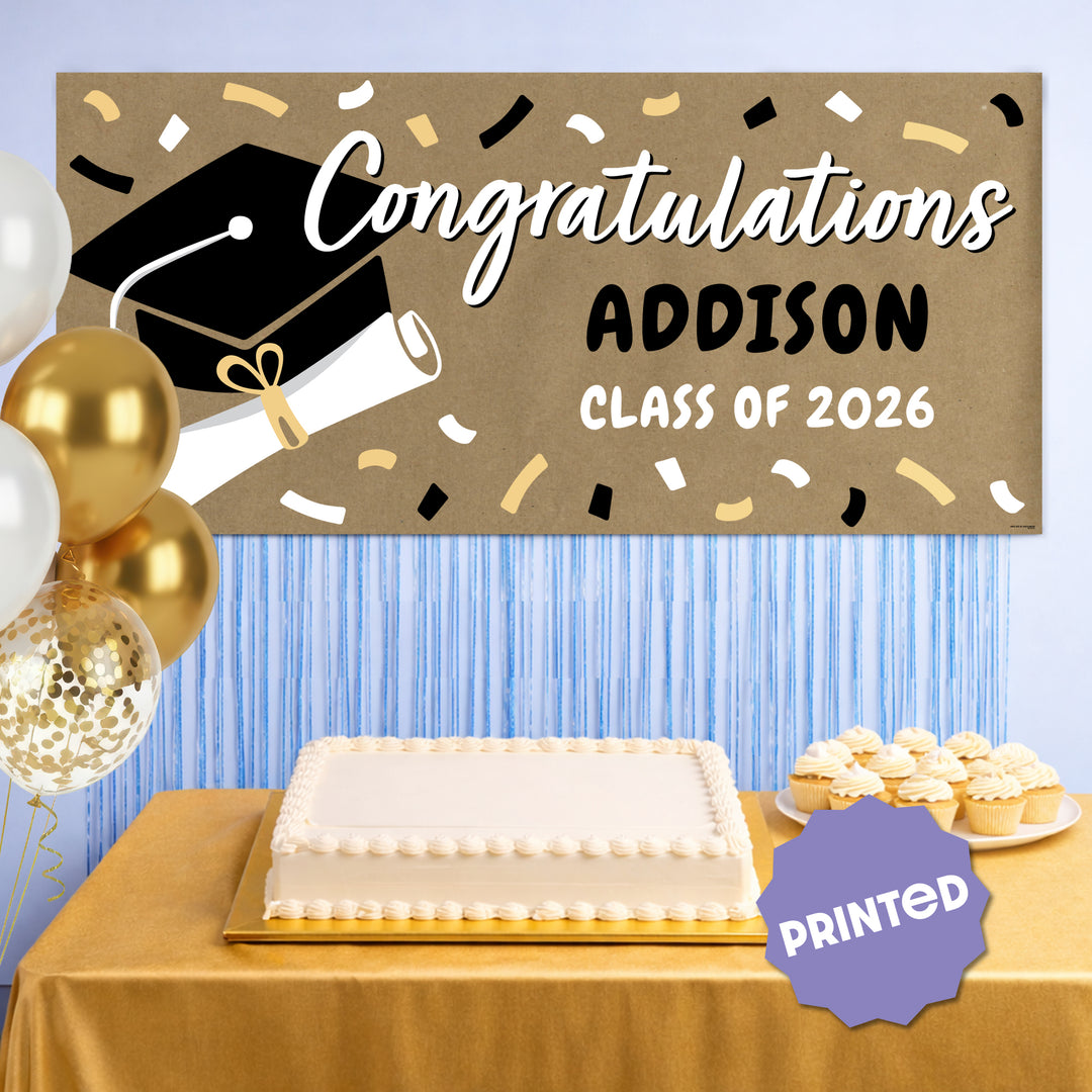 Black graduation banner displayed at party