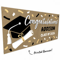 Black hand-painted style graduation banner close-up