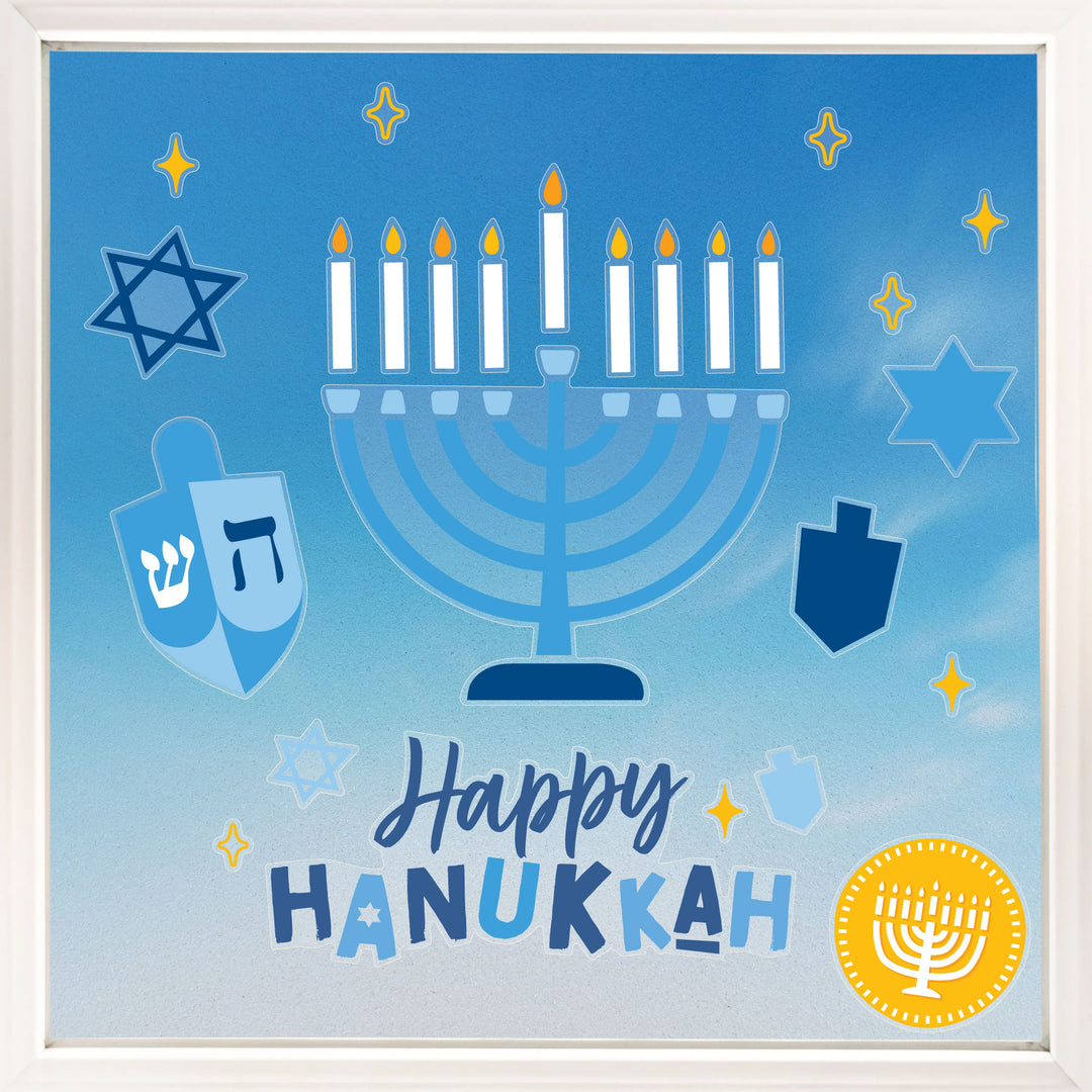 Happy Hanukkah window clings with Menorah, candles, dreidels, and stars on a blue background.
