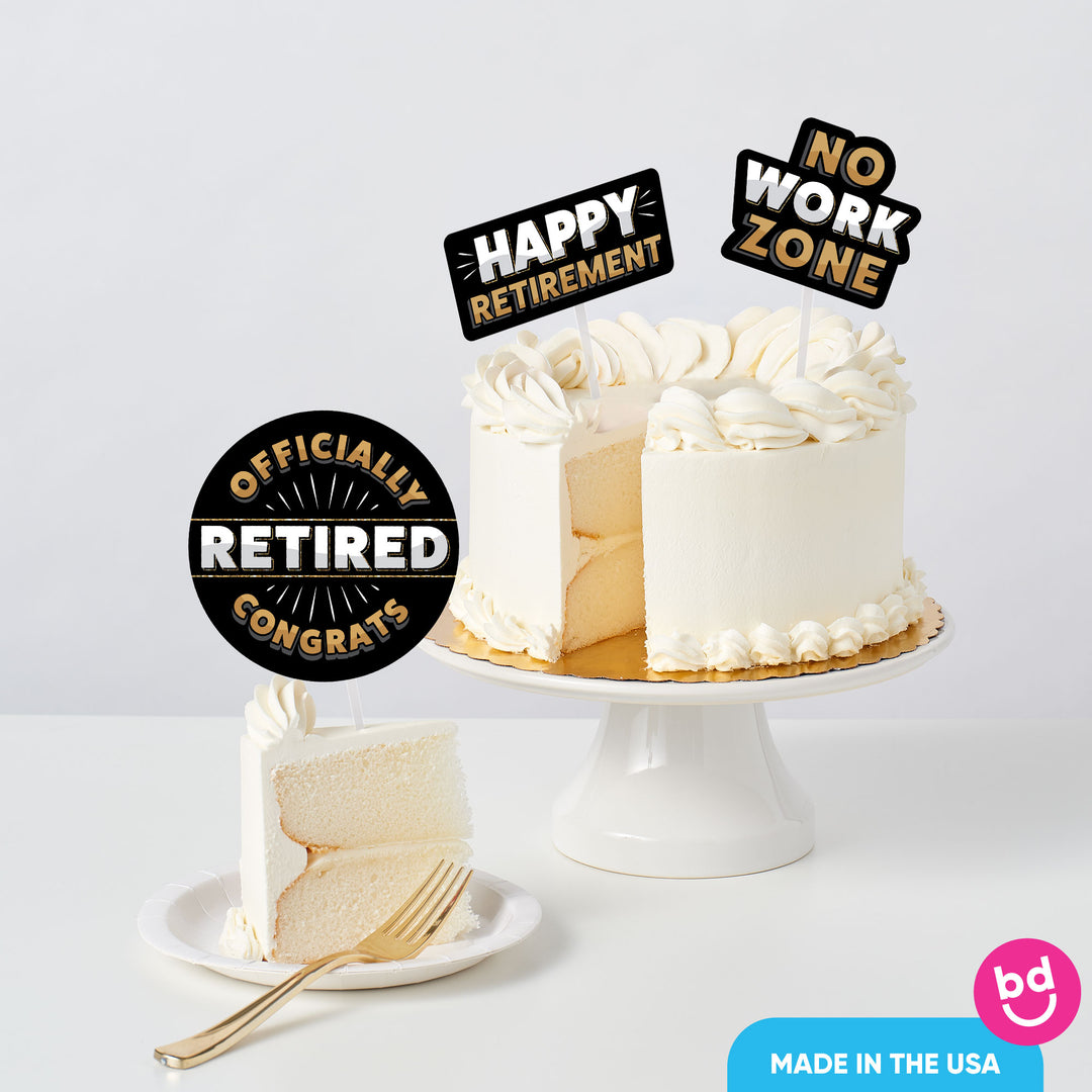 retirement party cake styled with layered topper decorations