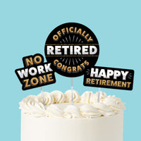Happy Retirement cake toppers 3 piece set on decorated party cake