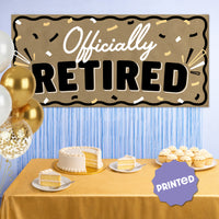 Retirement party backdrop with Officially Retired kraft banner display