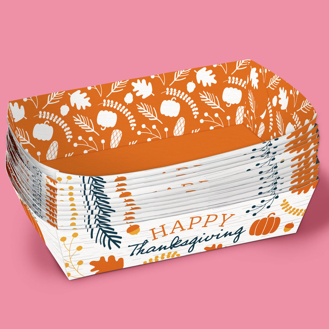 Stack of paper food boats with 'Happy Thanksgiving' design on a pink background