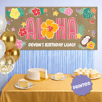 Island-themed party backdrop with personalized banner