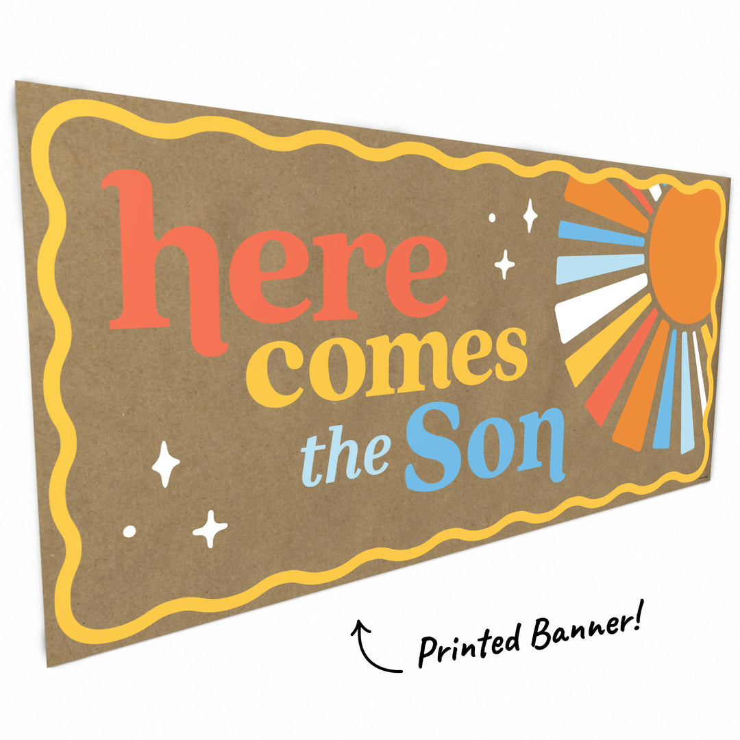 Close-up of retro sun graphic on baby shower banner