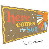 Close-up of retro sun graphic on baby shower banner