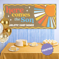 Sunshine baby shower banner styled as welcome sign backdrop