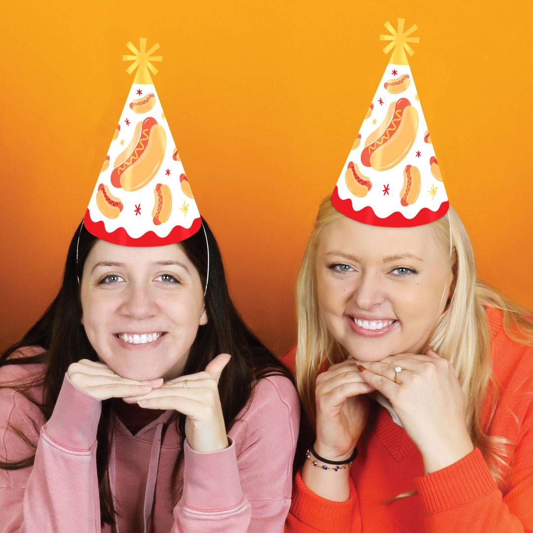 guests wearing hot dog hats at birthday party