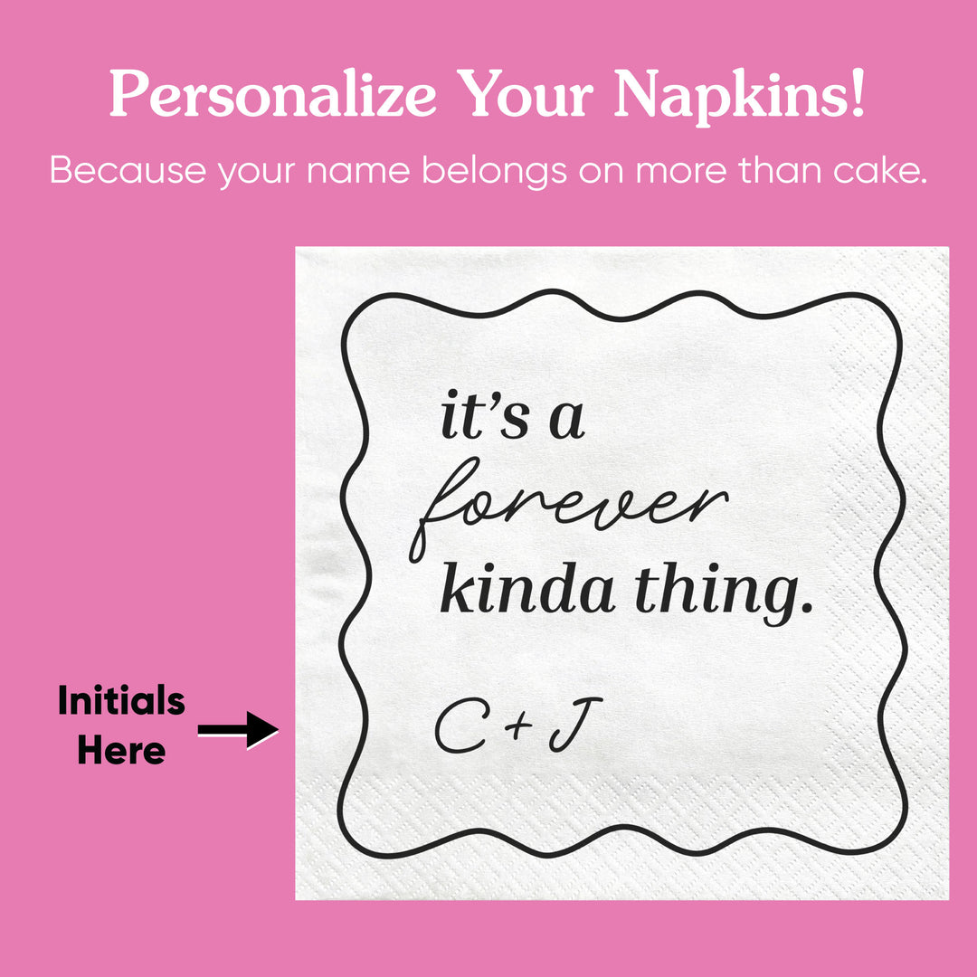 Personalized napkin with text and initials on a pink background