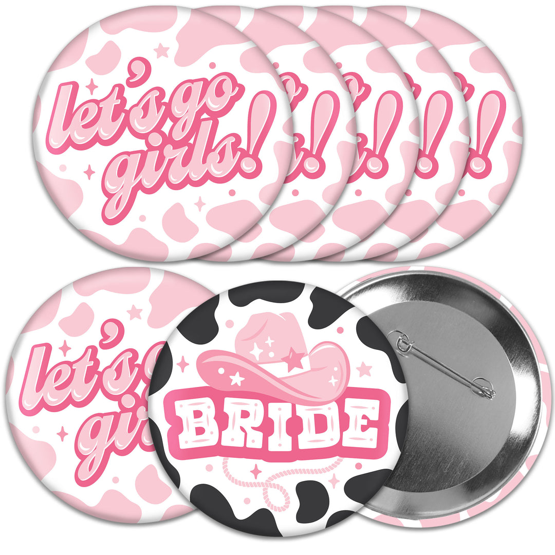 A set of 8 round pinback buttons with a pink cowgirl theme, including designs such as 'Let's go girls!' and 'BRIDE' with a cowgirl hat and hearts motif.