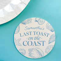 Round coaster with shell design and text 'Samantha's Last Toast on the Coast' on a teal background